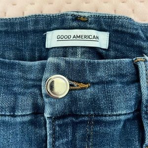 Good American Jeans Slim Fit with 2 Grey Stripes down each leg, size 10
